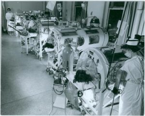 Photo of patients being treated by a Steel Lung. For All The Air In The World Forest Medical Equipment Calibration
